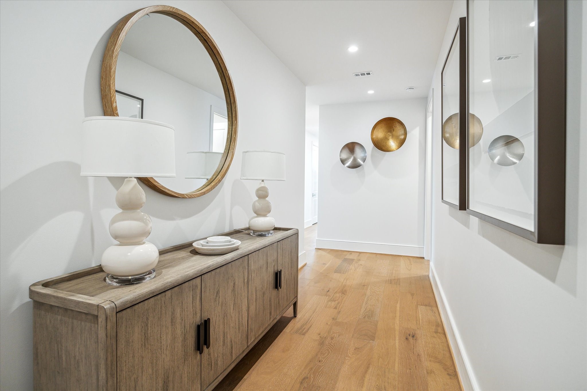 5656 San Felipe Street, Unit 606 Houston, TX 77056 - Photo 16 of 34 a view of a bathroom sink and a mirror