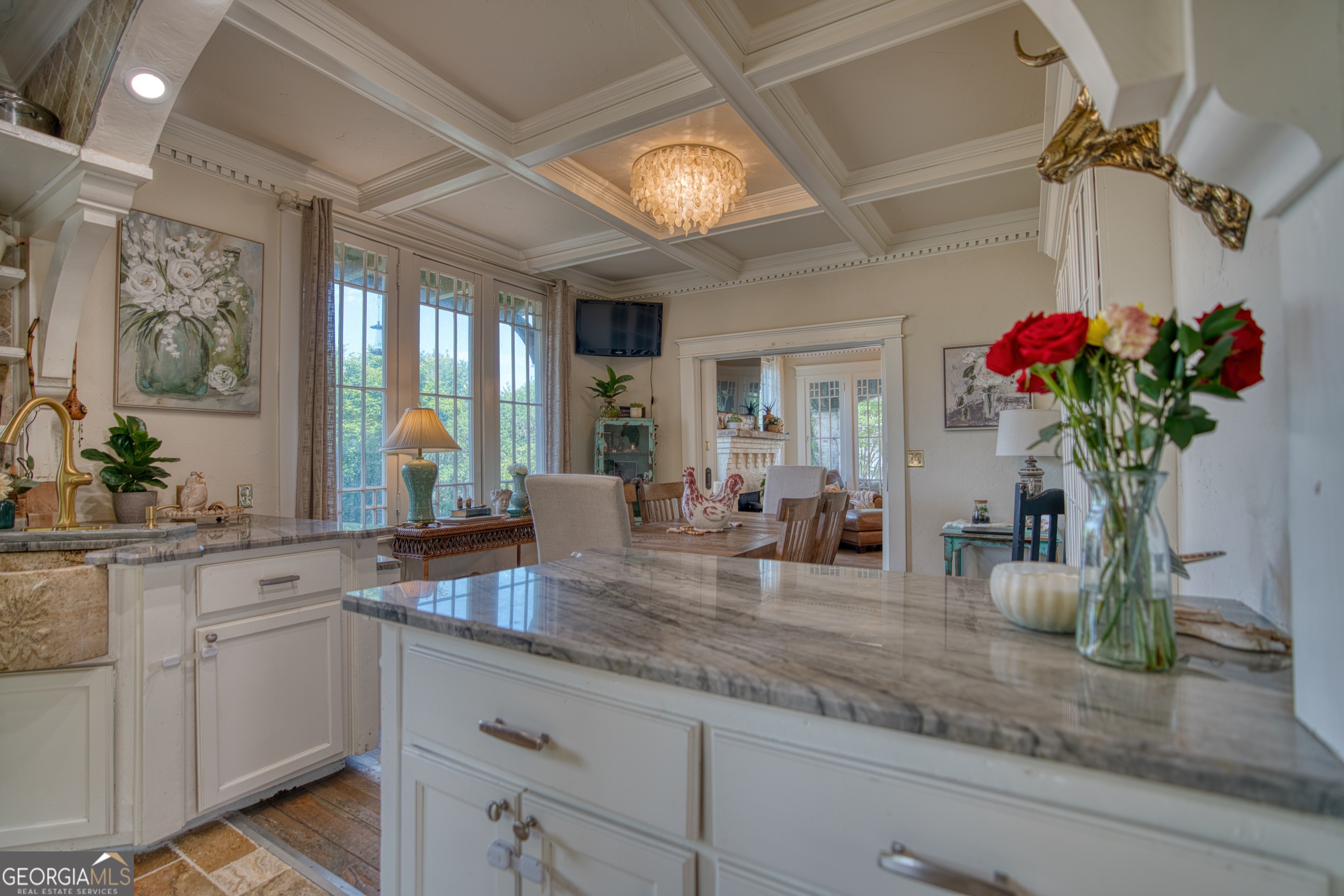 407 East 3rd Street Rome, GA 30161 - Photo 15 of 78 a kitchen with a potted plant on the counter and cabinets