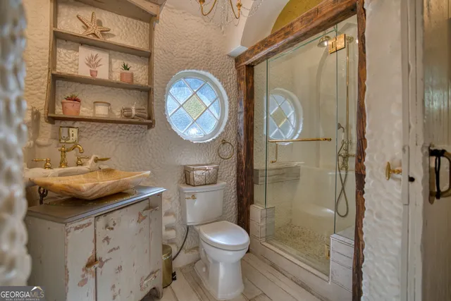 a outdoor living space with furniture and a potted plant