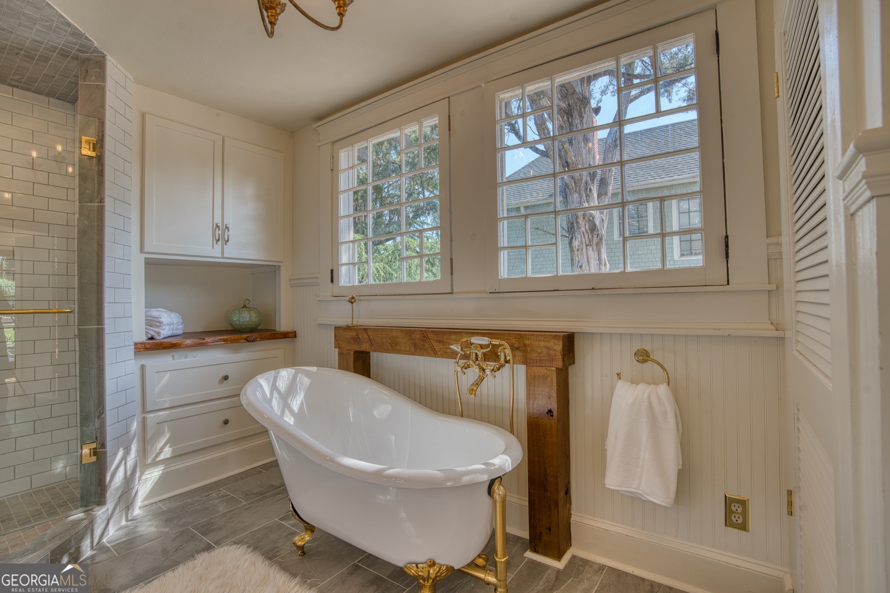 407 East 3rd Street Rome, GA 30161 - Photo 32 of 78 a living room with a couch and next to a window
