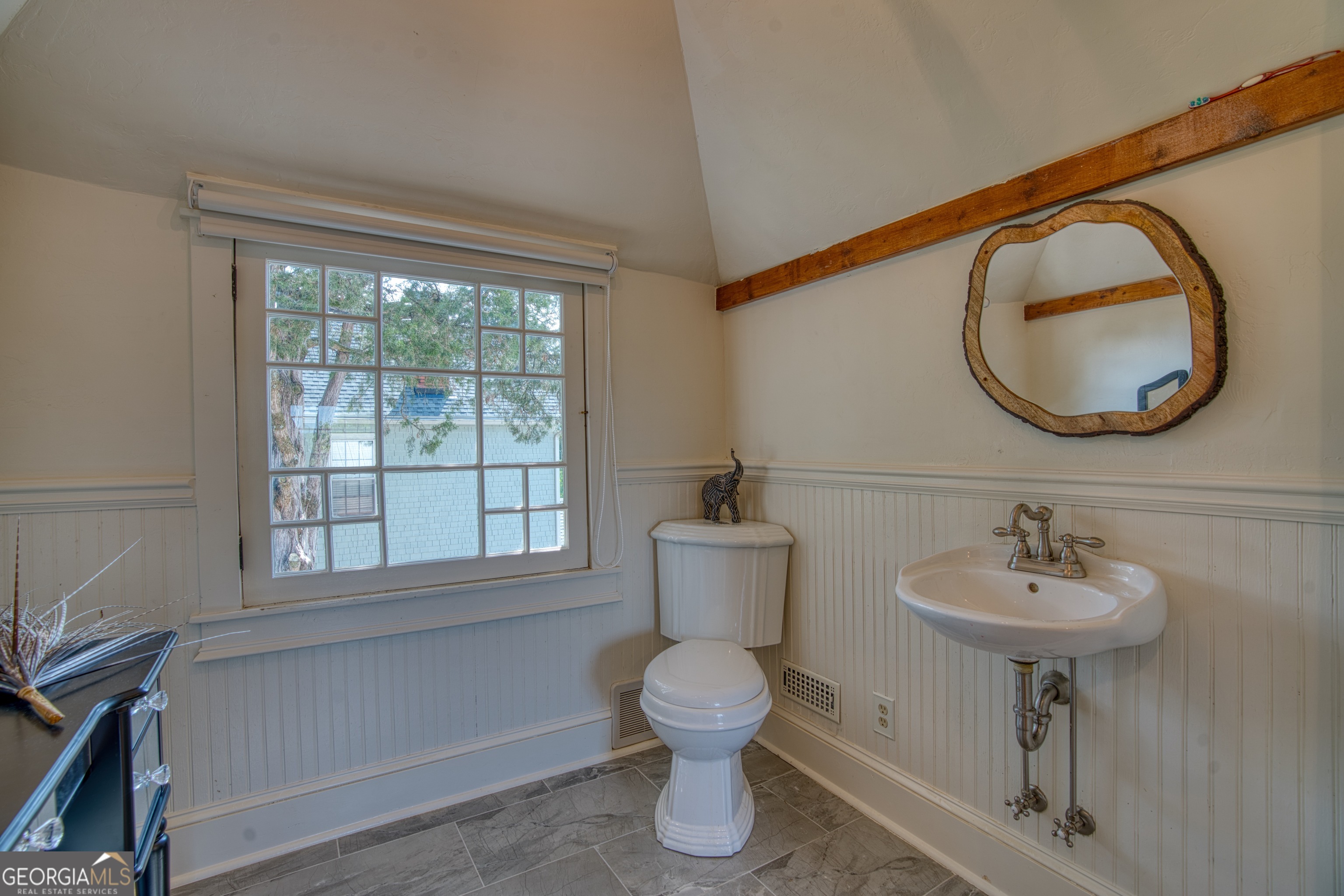 407 East 3rd Street Rome, GA 30161 - Photo 39 of 78 a bathroom with a toilet sink and mirror