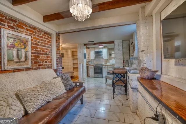 a picture of a bench in front of a wall