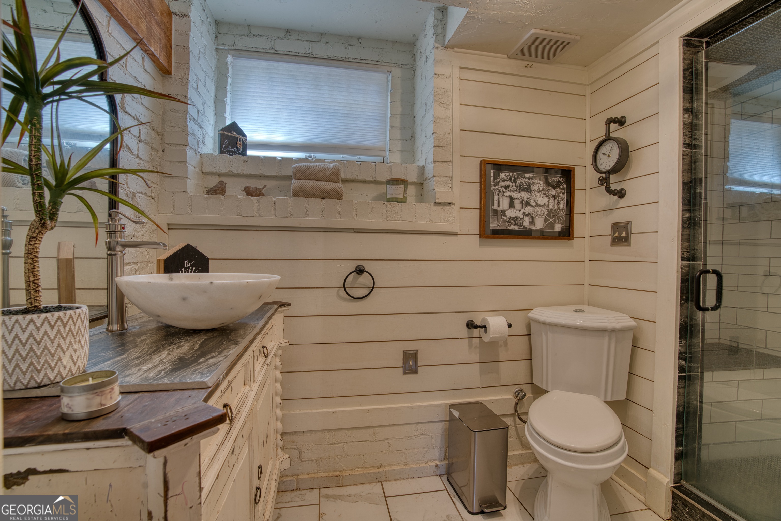 407 East 3rd Street Rome, GA 30161 - Photo 49 of 78 a bathroom with a toilet and a sink