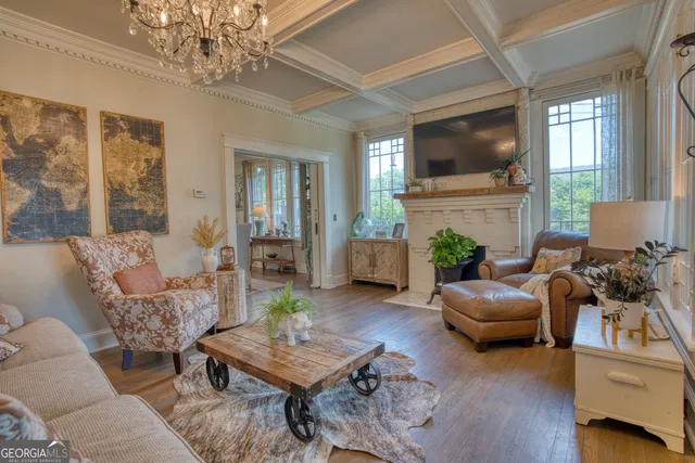 a living room with granite countertop furniture and a fireplace