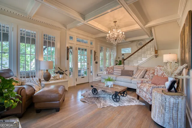 a dining room with furniture and window