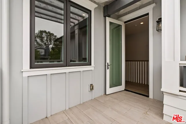 a room with furniture pool table and flat screen tv