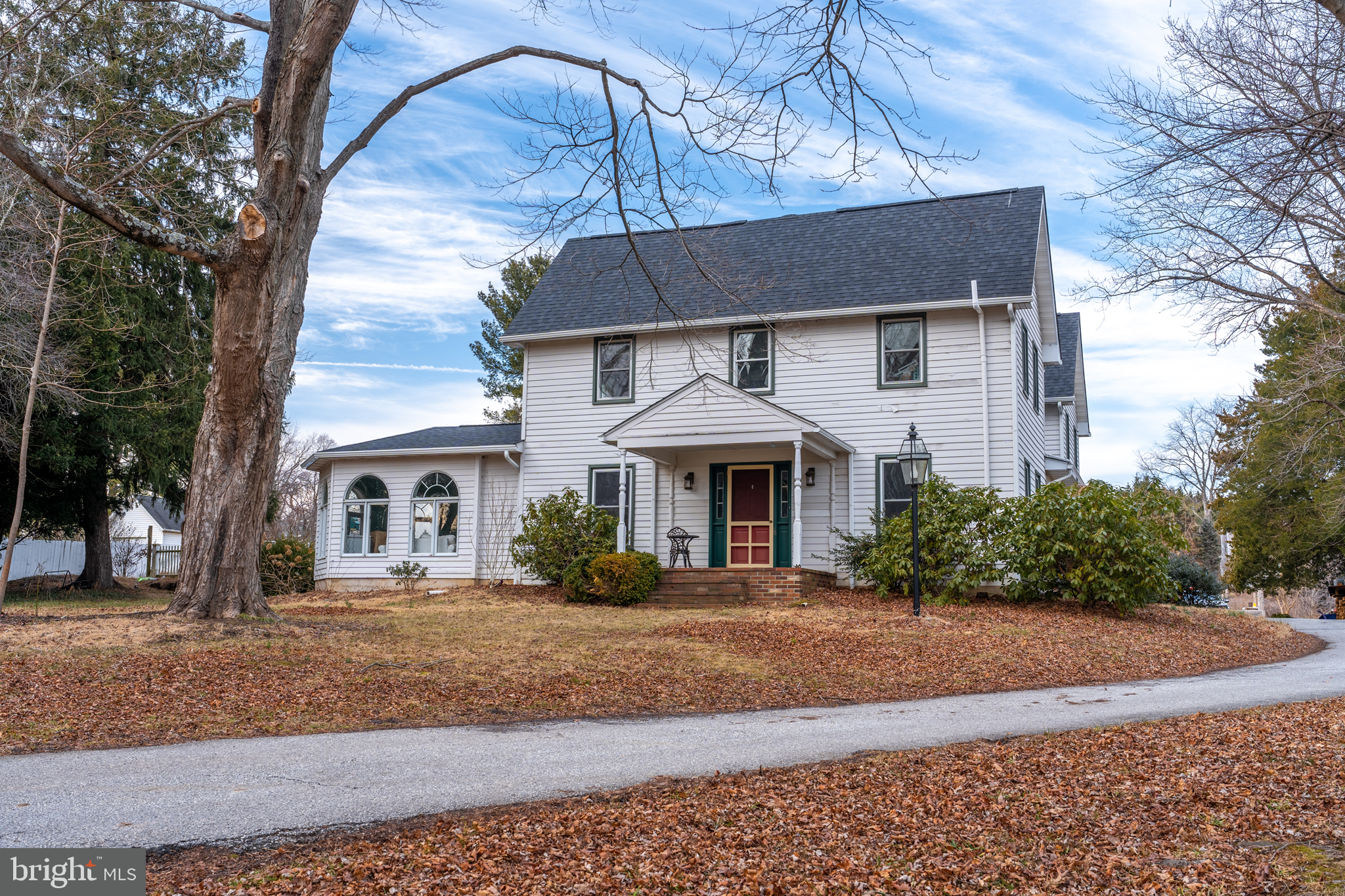 440 Smiths Mill Road Newark, DE 19711 - Photo 3 of 35 a front view of a house with a yard