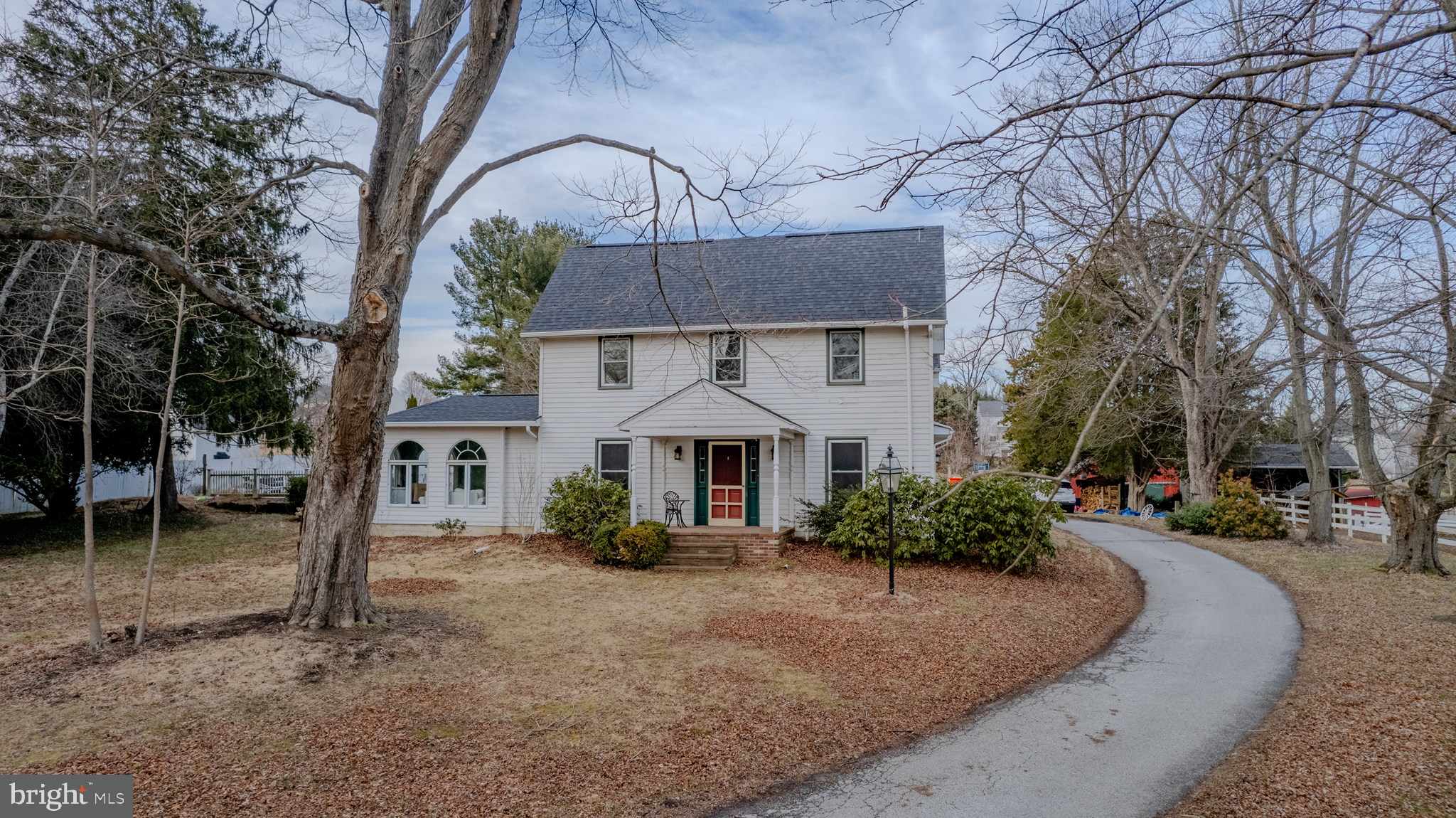 440 Smiths Mill Road Newark, DE 19711 - Photo 5 of 35 a front view of a house with garden