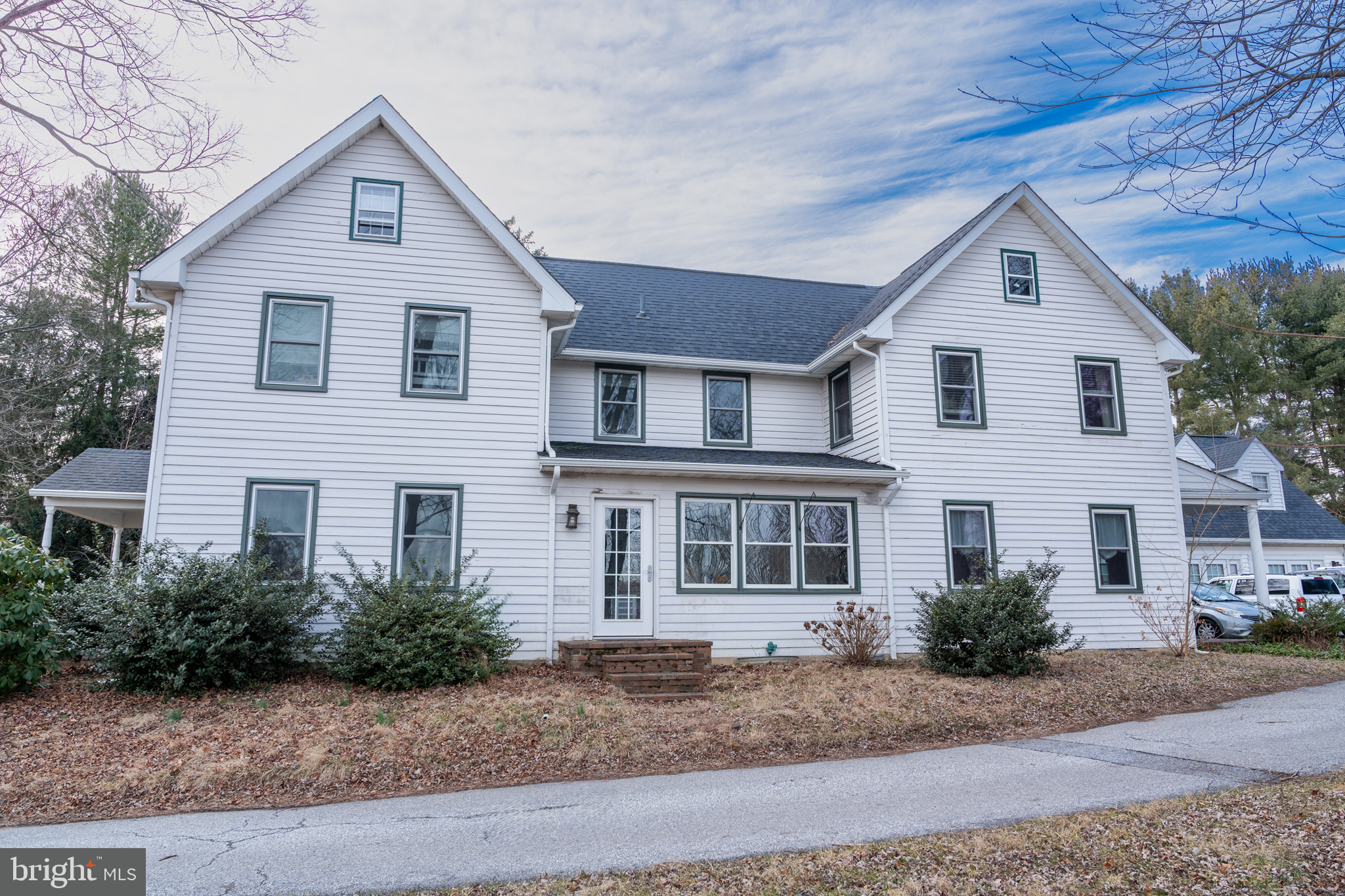 440 Smiths Mill Road Newark, DE 19711 - Photo 7 of 35 a front view of a house with a yard