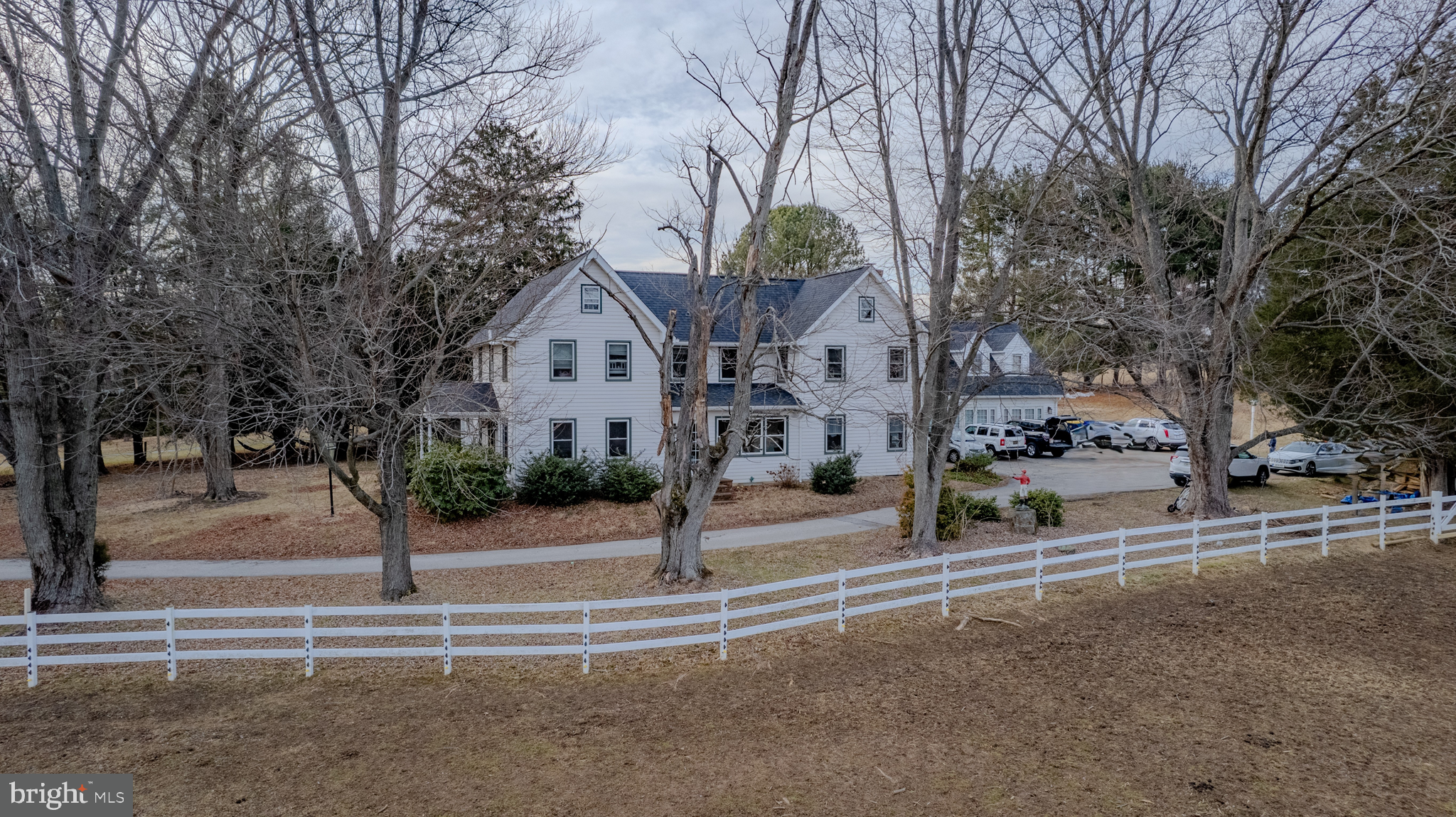 440 Smiths Mill Road Newark, DE 19711 - Photo 8 of 35 a front view of a house with a yard and large trees