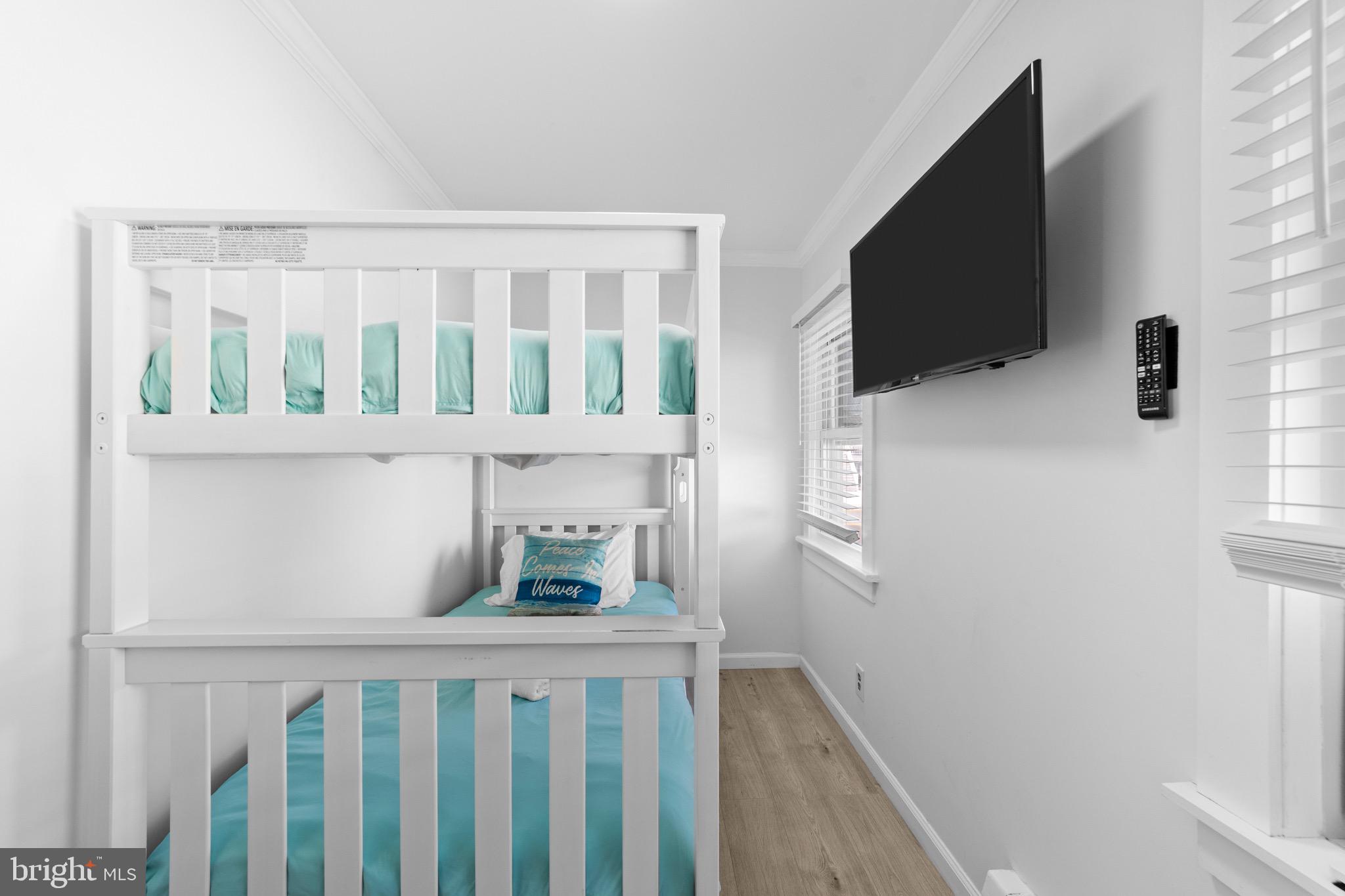 140 North Ocean Avenue Point Pleasant Beach, NJ 08742 - Photo 11 of 49 a bedroom with furniture and a window