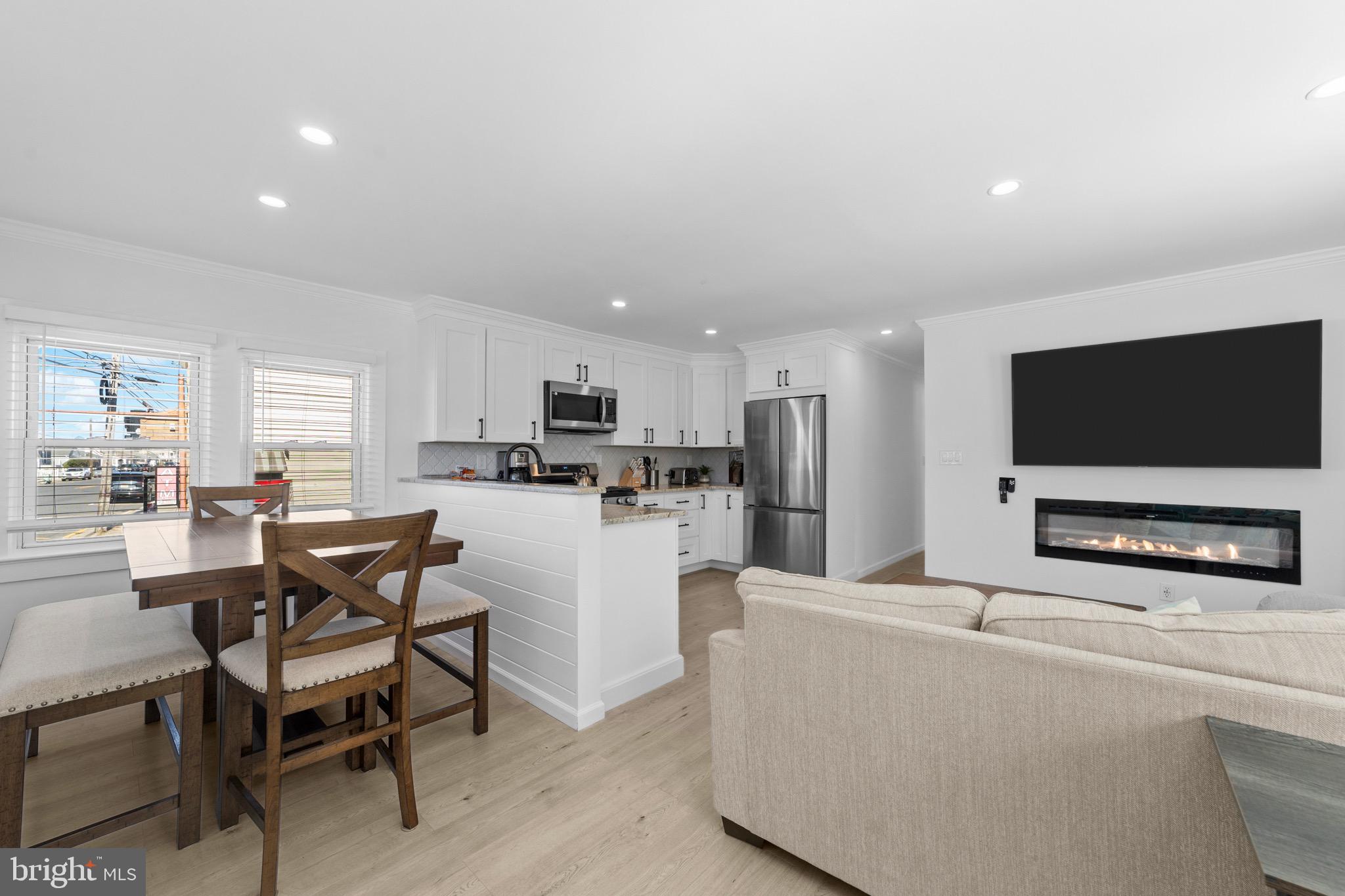 140 North Ocean Avenue Point Pleasant Beach, NJ 08742 - Photo 4 of 49 a living room with furniture and a flat screen tv