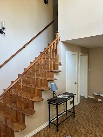 a view of hallway with stairs
