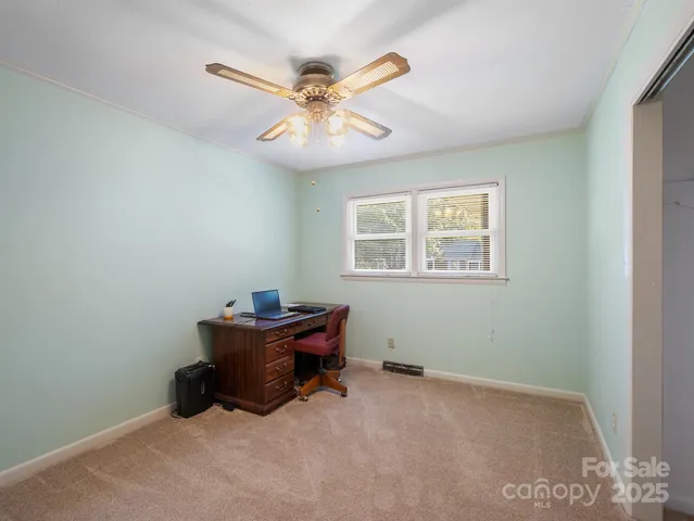 a bathroom with a bathtub shower sink vanity and toilet
