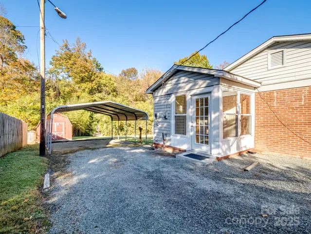 a house with huge green field in front of it
