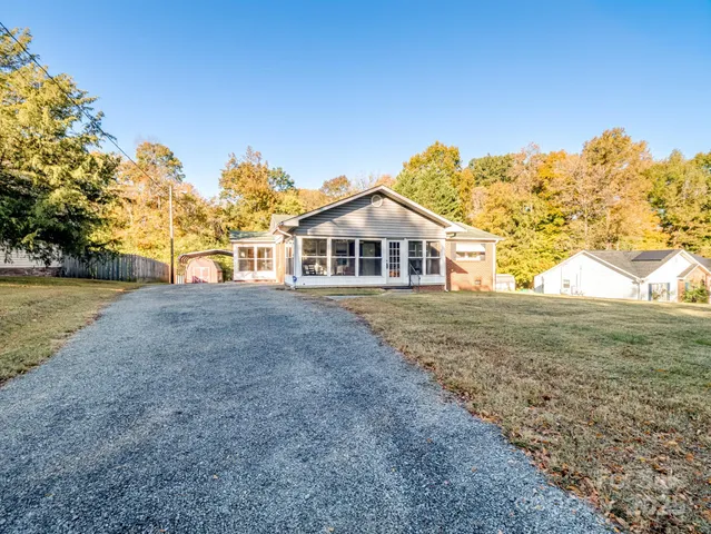 a sign board with parking space