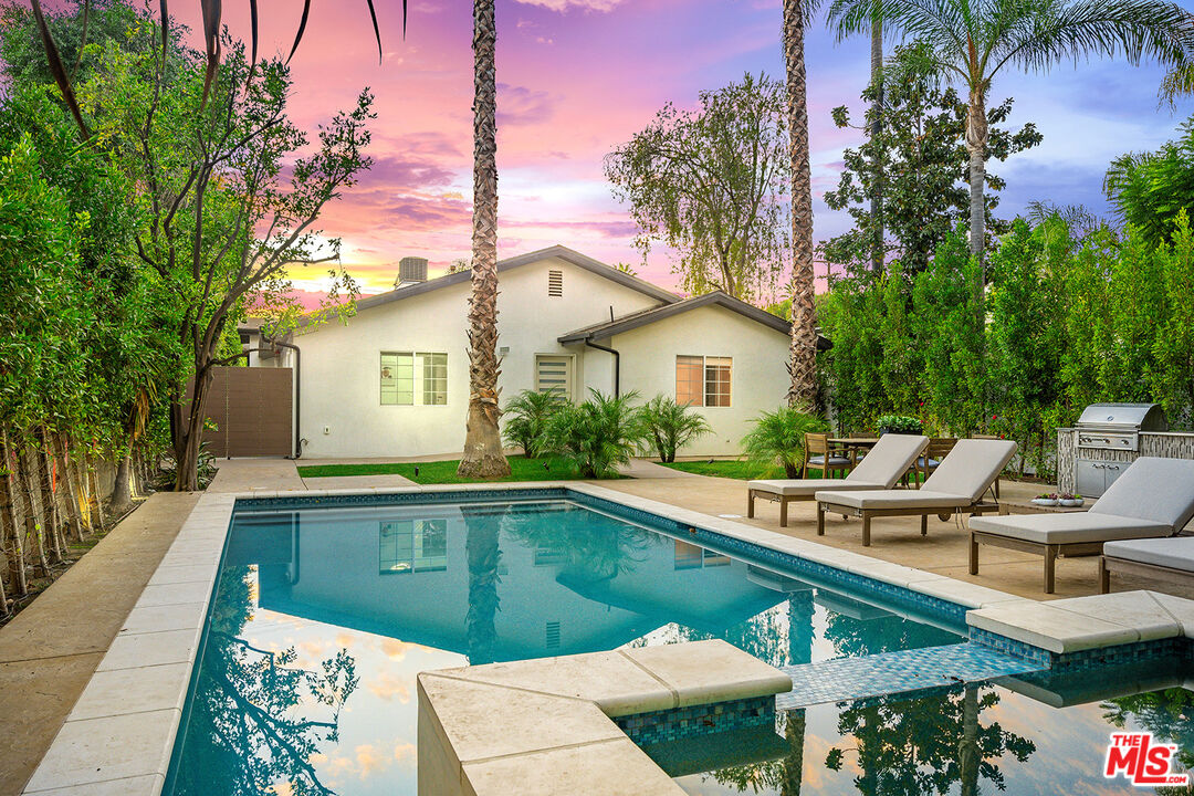 5010 Fulton Avenue Sherman Oaks, CA 91423 - Photo 11 of 55 a view of house with swimming pool outdoor seating