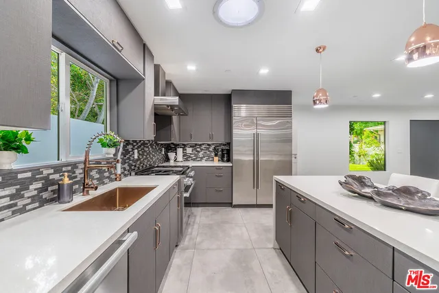 a bedroom with a bed and a chair