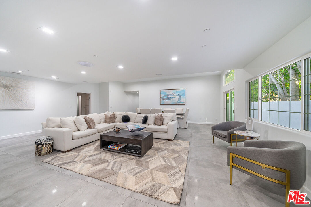 5010 Fulton Avenue Sherman Oaks, CA 91423 - Photo 20 of 55 a living room with furniture window and wooden floor