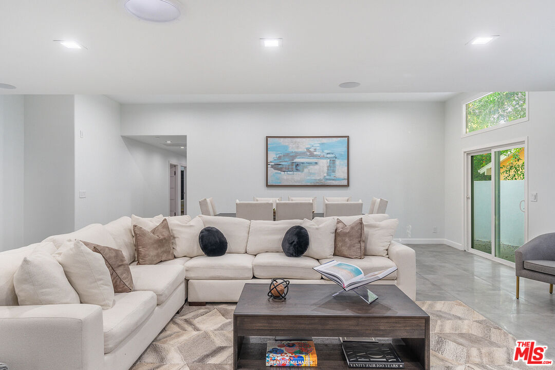 5010 Fulton Avenue Sherman Oaks, CA 91423 - Photo 22 of 55 a living room with furniture and a wooden floor