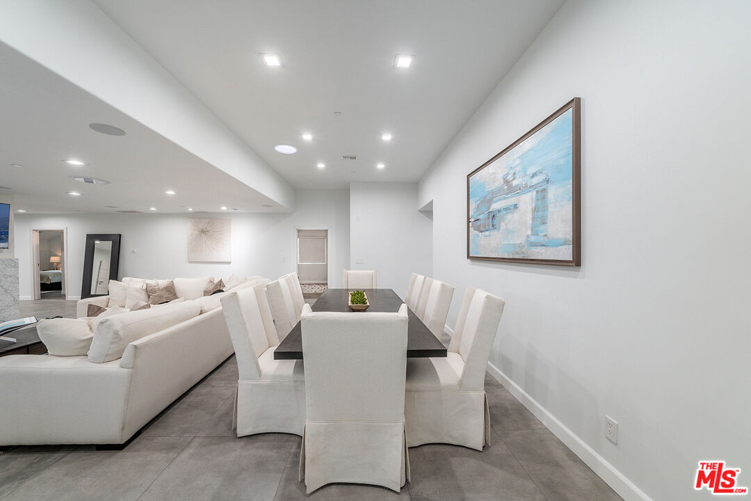5010 Fulton Avenue Sherman Oaks, CA 91423 - Photo 25 of 55 a living room with furniture and a painting on the wall