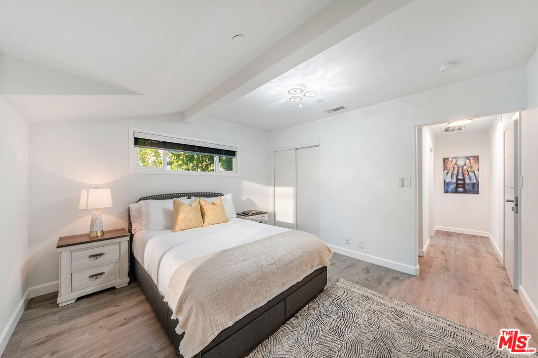 5010 Fulton Avenue Sherman Oaks, CA 91423 - Photo 30 of 55 a bedroom with a bed and a window