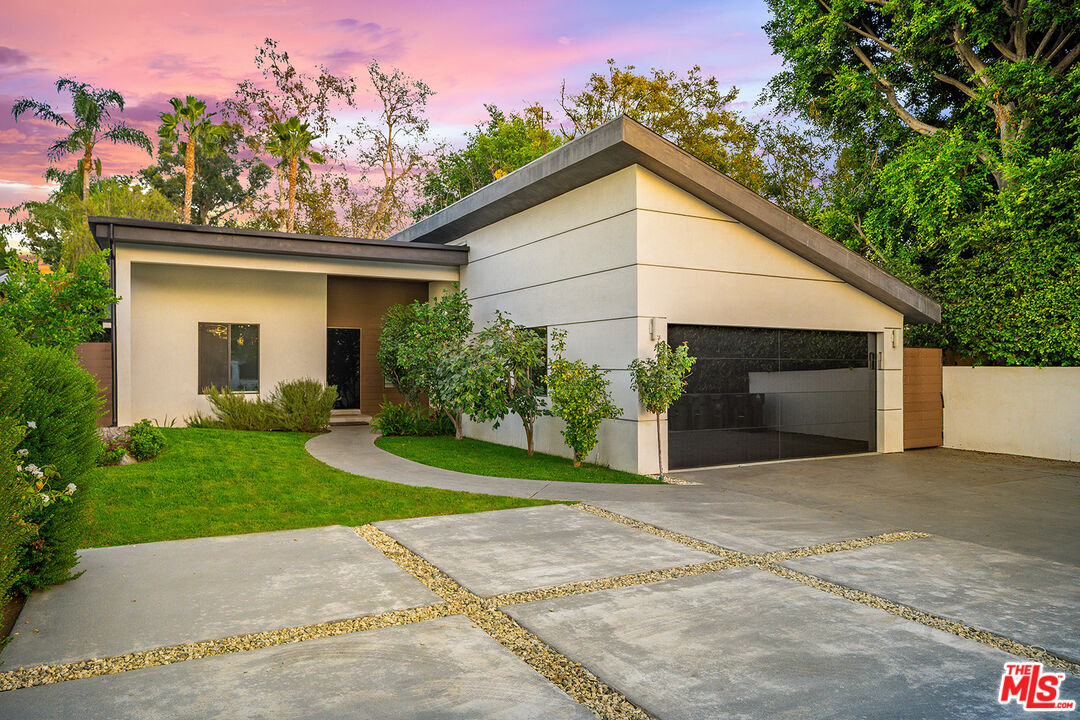 5010 Fulton Avenue Sherman Oaks, CA 91423 - Photo 3 of 55 a view of a house with a yard and potted plants