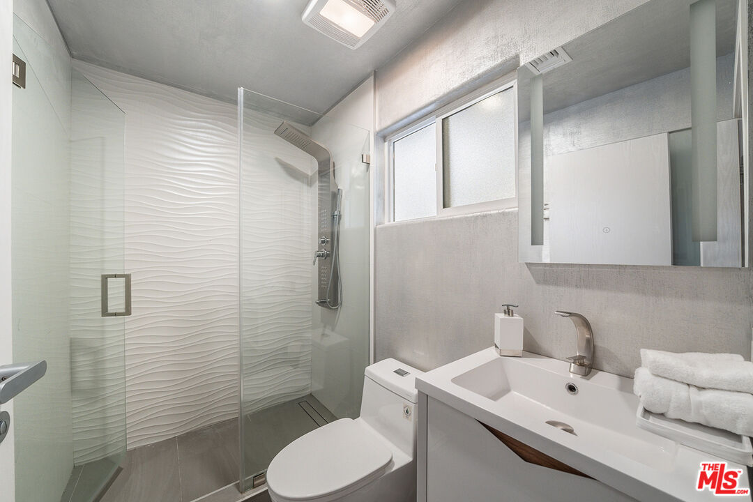5010 Fulton Avenue Sherman Oaks, CA 91423 - Photo 37 of 55 a bathroom with a sink a toilet and shower