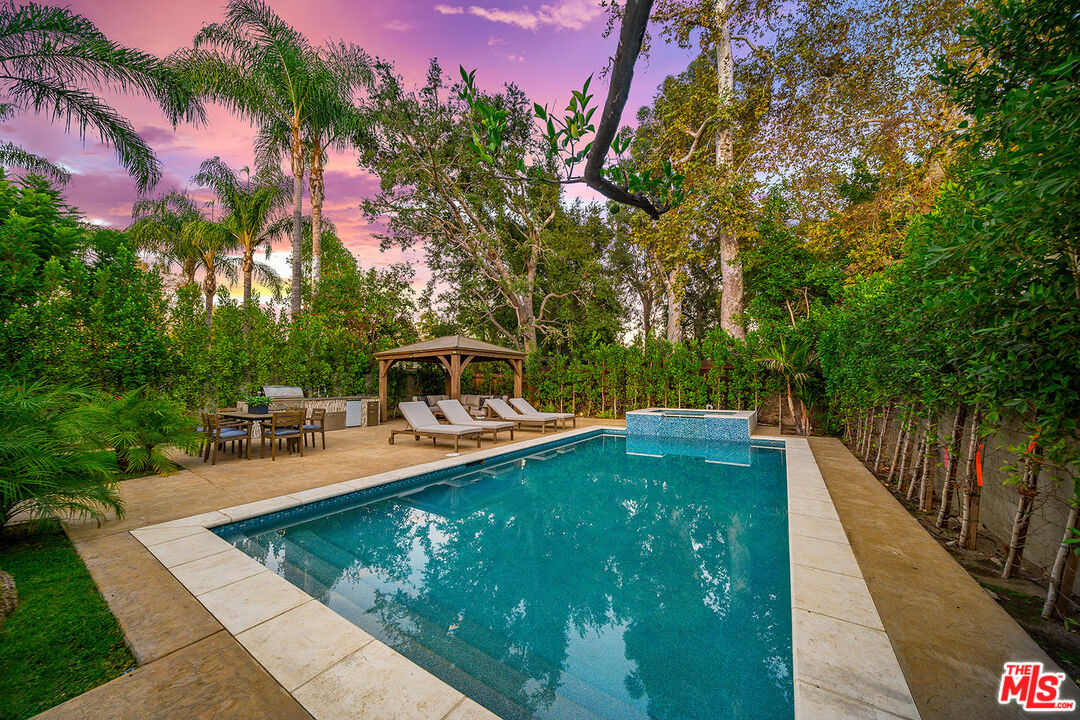 5010 Fulton Avenue Sherman Oaks, CA 91423 - Photo 4 of 55 a view of a swimming pool with a patio