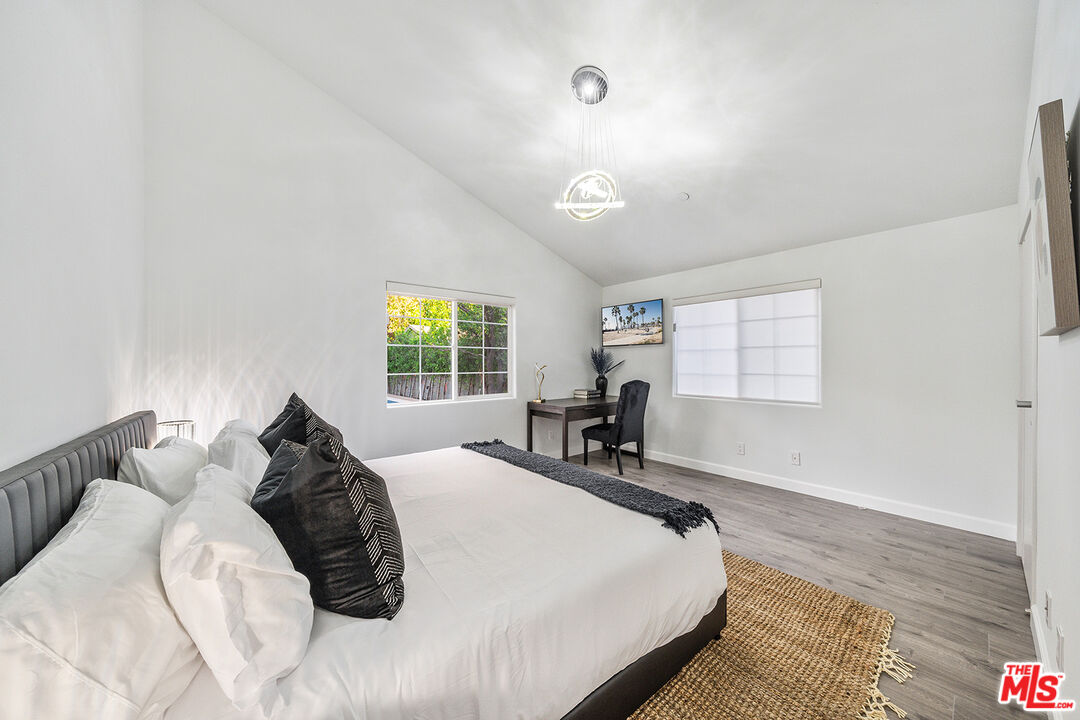 5010 Fulton Avenue Sherman Oaks, CA 91423 - Photo 48 of 55 a bed room with a bed and a chair