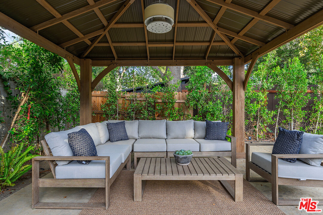 5010 Fulton Avenue Sherman Oaks, CA 91423 - Photo 52 of 55 a view of patio with a table and chairs
