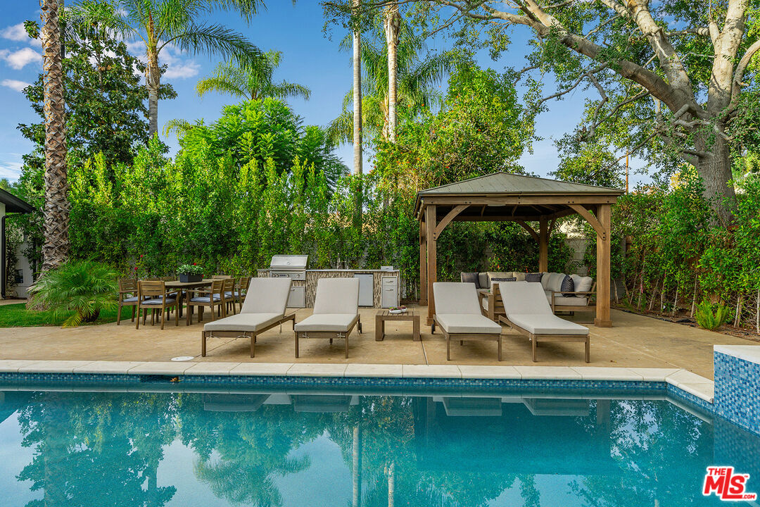 5010 Fulton Avenue Sherman Oaks, CA 91423 - Photo 55 of 55 a view of a swimming pool with chairs