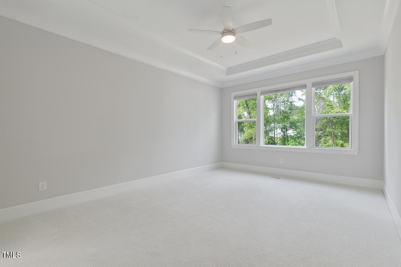 816 Crimson Rdg Trail Fuquay-Varina, NC 27526 - Photo 16 of 42 an empty room with windows