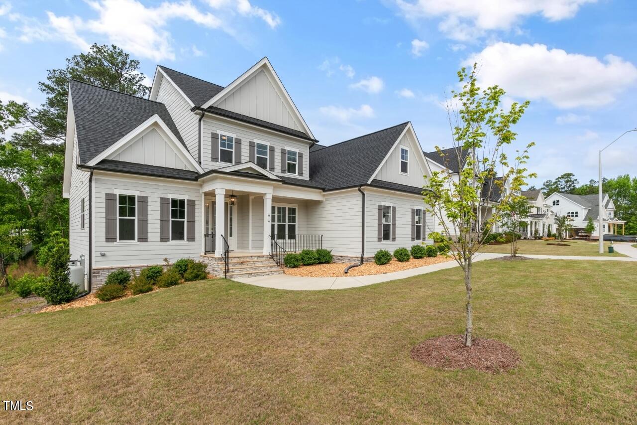 816 Crimson Rdg Trail Fuquay-Varina, NC 27526 - Photo 2 of 42 a front view of a house with a porch