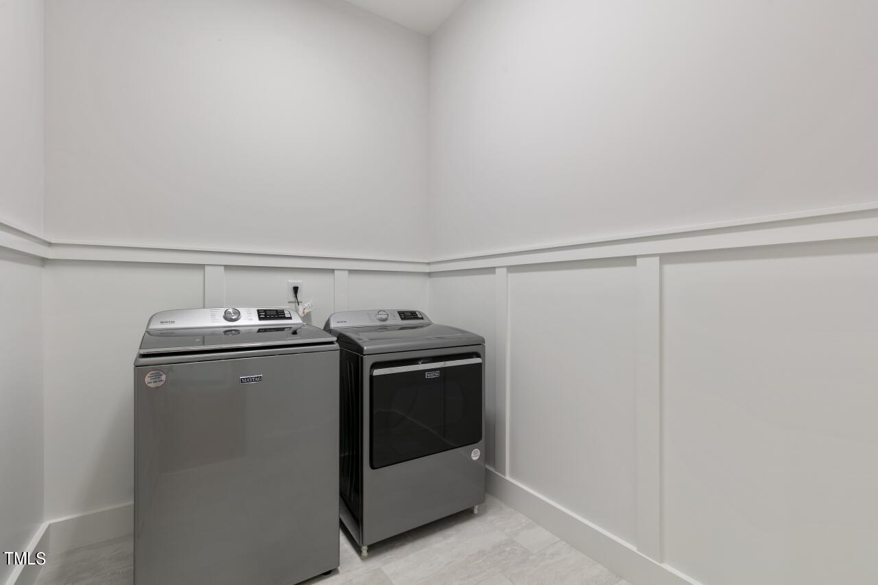 816 Crimson Rdg Trail Fuquay-Varina, NC 27526 - Photo 25 of 42 a utility room with dryer and washer
