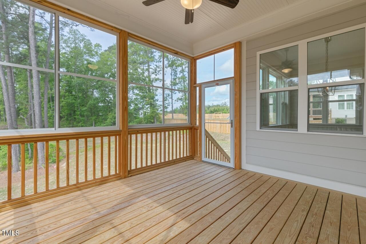816 Crimson Rdg Trail Fuquay-Varina, NC 27526 - Photo 26 of 42 a view of a room with wooden floor and balcony