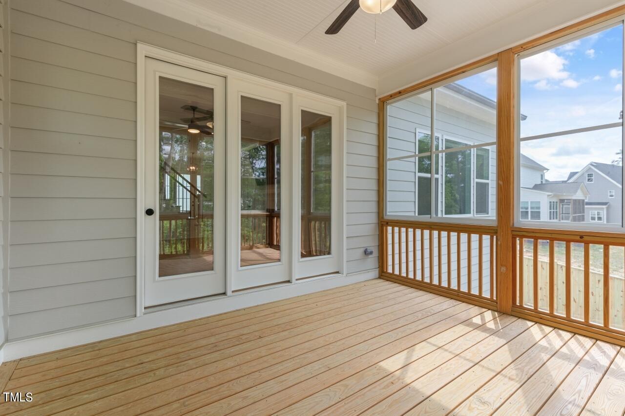 816 Crimson Rdg Trail Fuquay-Varina, NC 27526 - Photo 27 of 42 a view of a balcony with wooden floor
