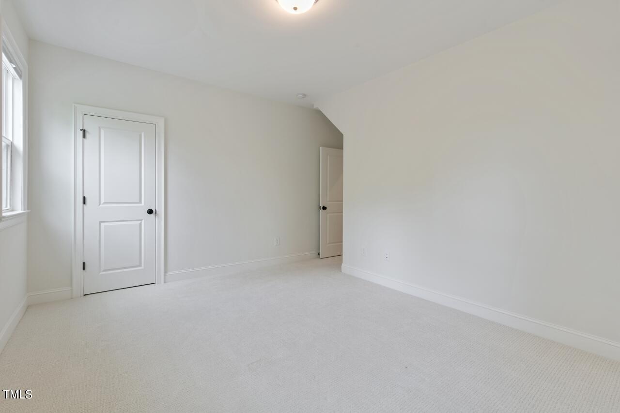 816 Crimson Rdg Trail Fuquay-Varina, NC 27526 - Photo 32 of 42 a view of an empty room