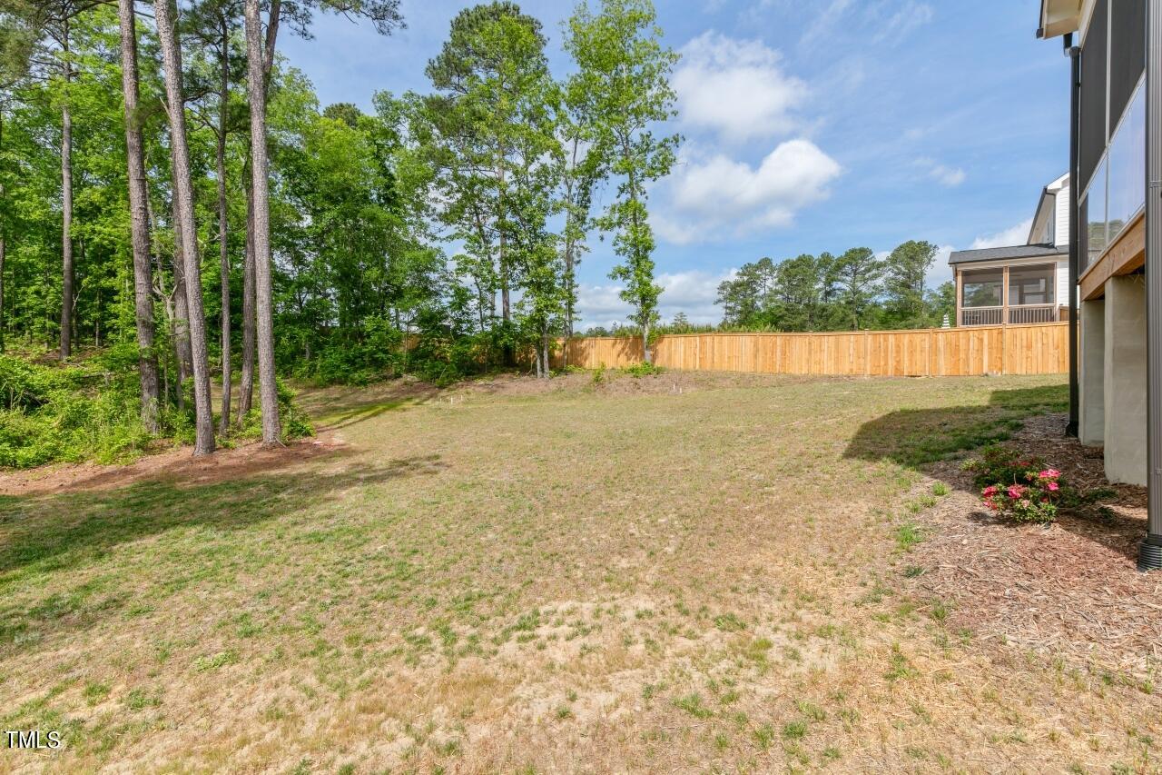 816 Crimson Rdg Trail Fuquay-Varina, NC 27526 - Photo 41 of 42 a view of an outdoor space and yard