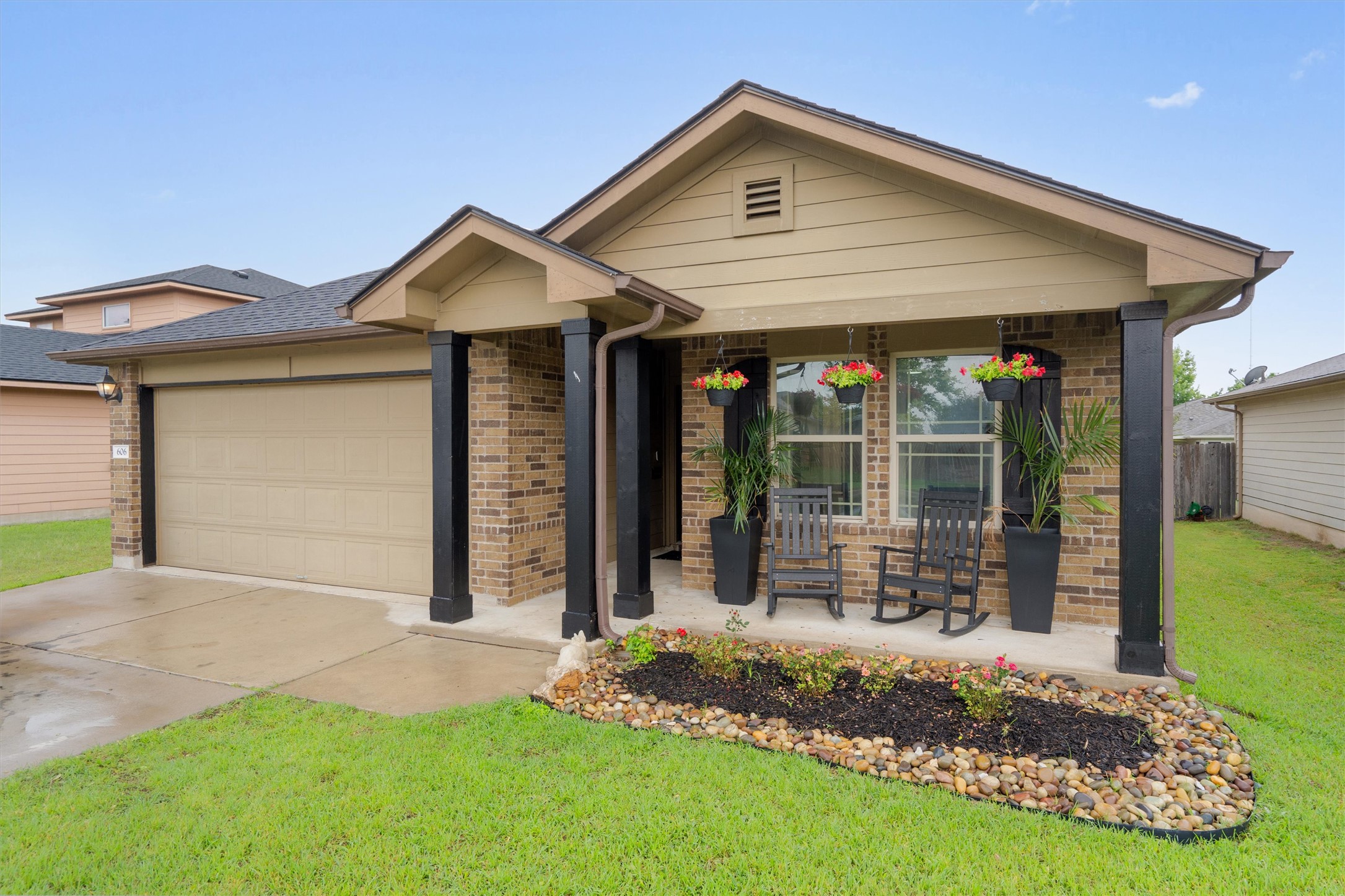606 Old Peak Road Georgetown, TX 78626 - Photo 18 of 23 a front view of a house with a yard