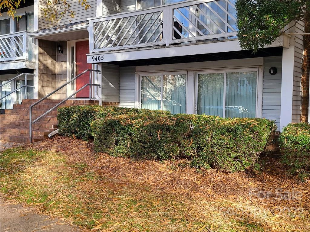9405 Old Concord Road, Unit D Charlotte, NC 28213 - Photo 1 of 17 a view of a house with large windows