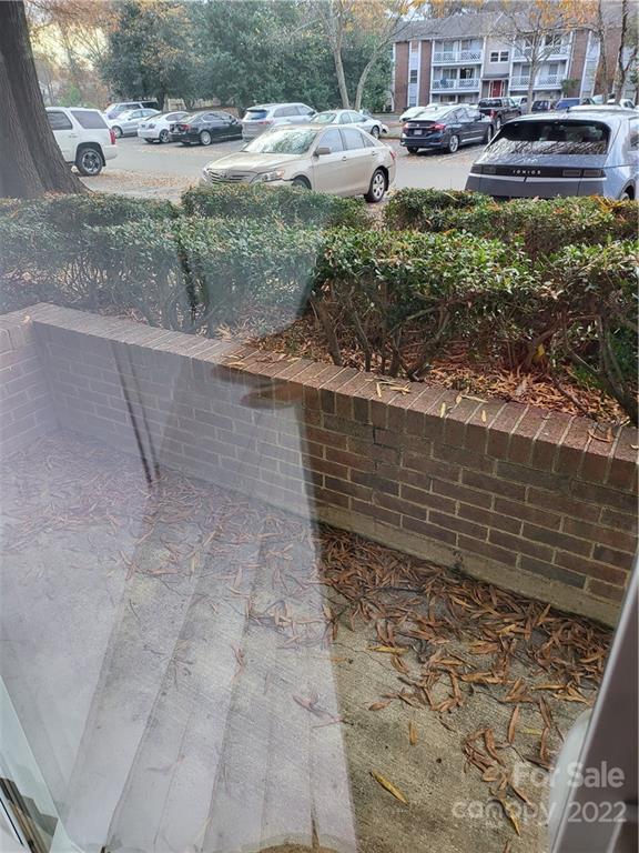 9405 Old Concord Road, Unit D Charlotte, NC 28213 - Photo 14 of 17 a view of a yard with an outdoor seating