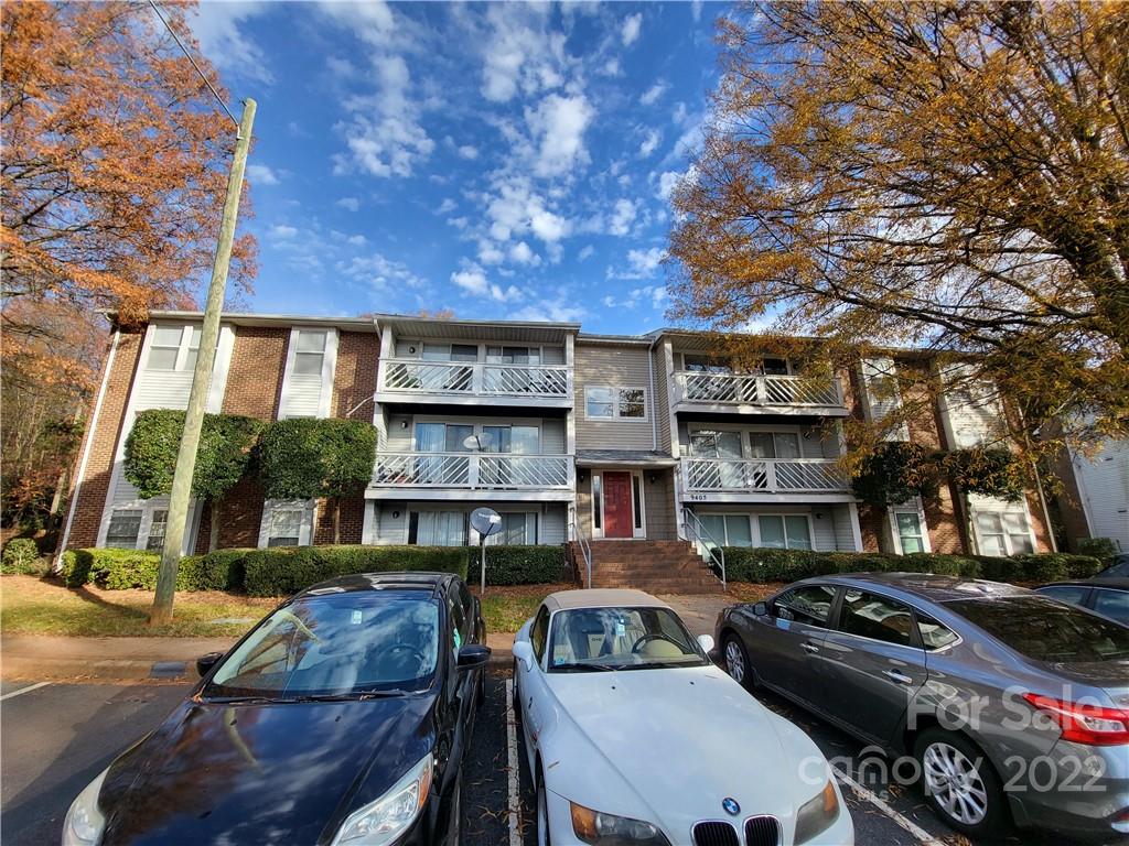 9405 Old Concord Road, Unit D Charlotte, NC 28213 - Photo 16 of 17 a view of a cars park in front of a building