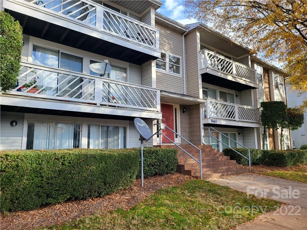 9405 Old Concord Road, Unit D Charlotte, NC 28213 - Photo 2 of 17 a view of a house with a yard