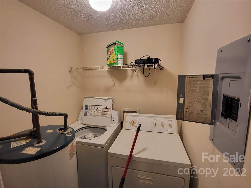 9405 Old Concord Road, Unit D Charlotte, NC 28213 - Photo 8 of 17 a utility room with dryer and washer