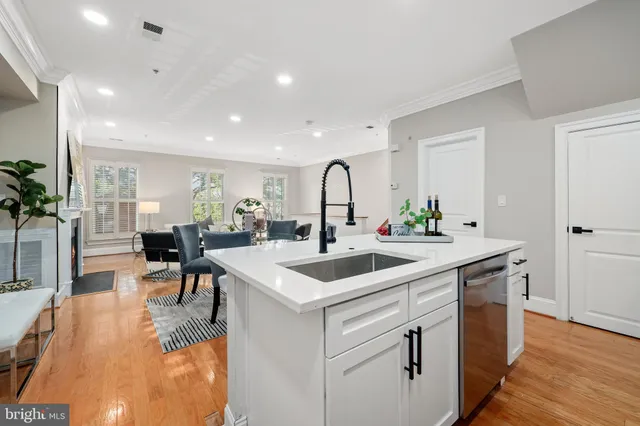 a kitchen with a sink and stove