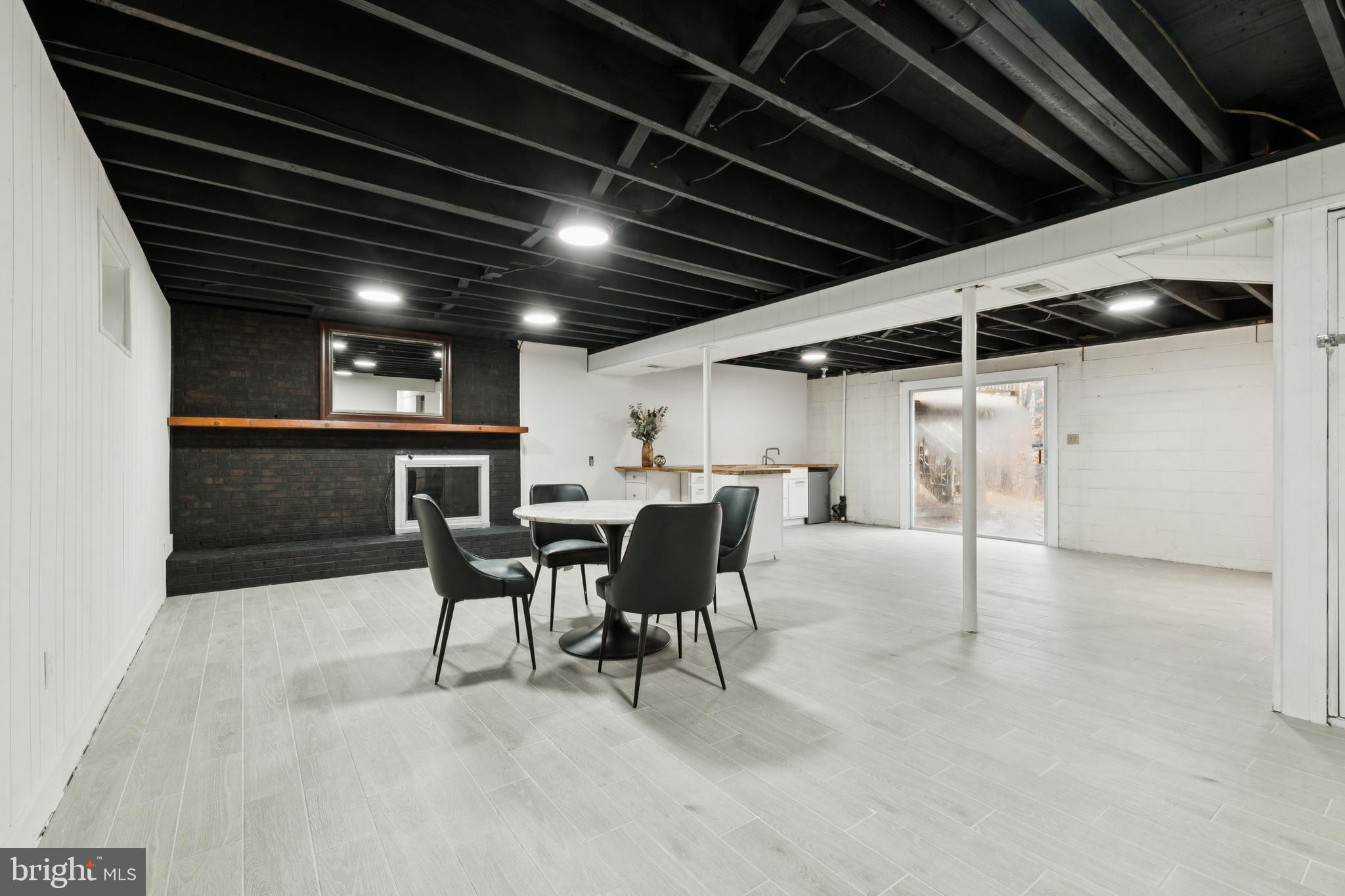 Basement large living area with ceramic tile floor