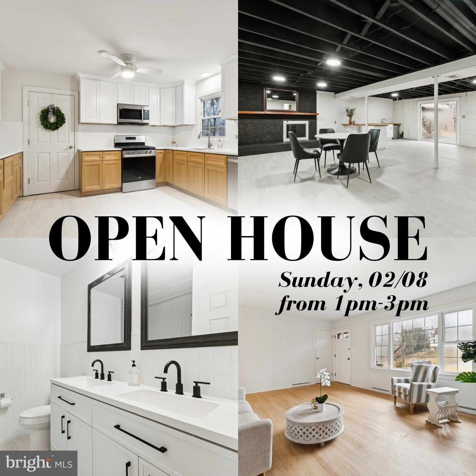a kitchen with kitchen island stainless steel appliances a sink and cabinets
