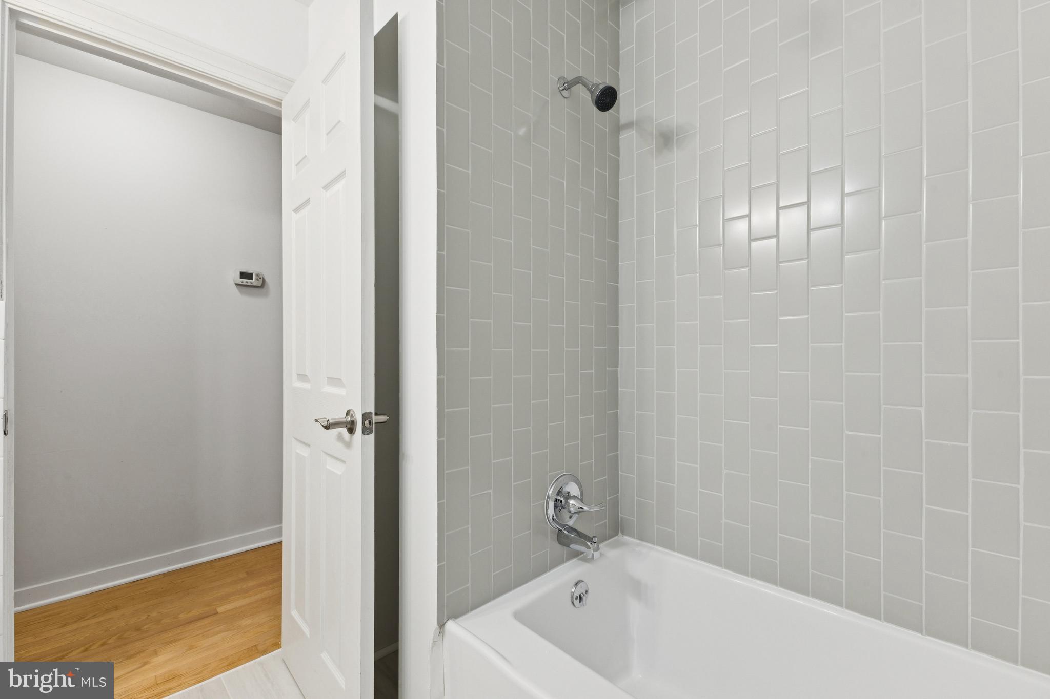28 Ridgemore Circle Fredericksburg, VA 22405 - Photo 15 of 34 a bathroom with a tub shower and vanity