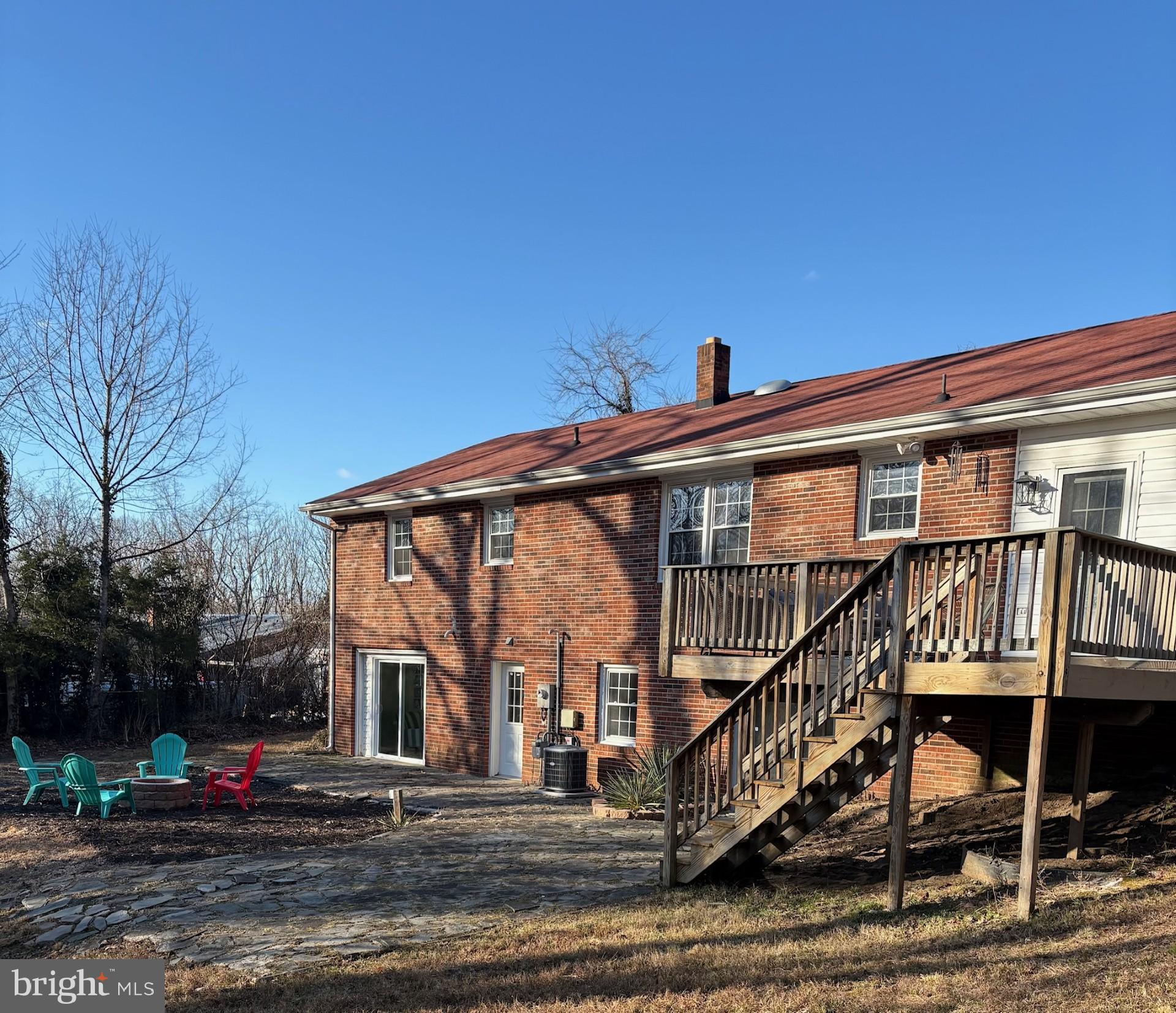 28 Ridgemore Circle Fredericksburg, VA 22405 - Photo 23 of 32 Back yard deck off kitchen and a stone patio
